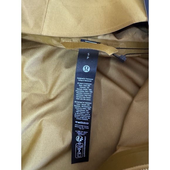 NEW Lululemon Stretch Glyde Waterproof Jacket Size Small Melt Yellow Cinchable - Picture 11 of 16